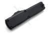 lose-up of the Microtech UTX-85 handle with Microtech claw logo and black anodized finish.