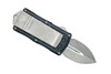 Microtech Exocet OTF knife closed displaying integrated stainless steel money clip