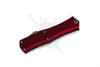 Closed Hera II Mini highlighting deep red anodized aluminum handle