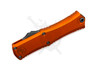 Microtech Mini Hera OTF knife with orange aluminum handle shown closed, logo side view.