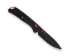 Buck 700 Nomad folding knife open showing clip side, black handle, red thumb stud, and D2 blade marking