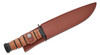 Knife sheathed in brown leather sheath showing full handle and belt carry design