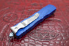 Closed rear side of Marfione Dirac custom automatic knife with pocket clip and glass breaker