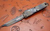 Microtech Ultratech Wookie Tanto automatic knife deployed showing detailed blade pattern and handle texture