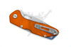 Buck 724 Mustang closed knife with orange handle and reversible pocket clip
