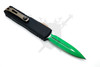 Microtech UTX-85 Gen IV Jedi Master OTF automatic knife open reverse angle showing titanium pocket clip and green dagger blade
