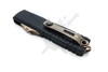 Back side angled view of Microtech UTX-85 Gen IV Jedi Master automatic knife with titanium clip and bronze glass breaker