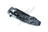 Closed Wolf Moon folding knife showing detailed howling wolf and moon handle graphics