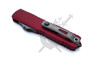 Rear view of Microtech UTX-70 Gen IV Merlot automatic knife showing titanium pocket clip and glass breaker