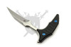 Angled view of the Marfione Select Bee fixed blade showing blue titanium hardware and ergonomic push dagger handle