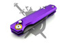 Closed purple aluminum handle of the Pocket Flash Micro automatic knife with gold accent.
