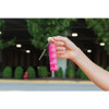 Person holding the SABRE Fast Flip Top pepper gel by the attached keychain for quick everyday carry access