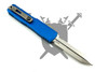 Reverse view of the Microtech UTX-70 Gen IV showing the blue anodized aluminum handle, titanium pocket clip, and stonewashed Spartan blade
