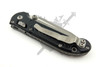 Rear view of the Microtech LUDT RAM-LOK displaying the steel tip-up pocket clip, hardware, and textured handle construction.