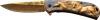 Close-up of the Masters Collection MC-A031GD showing detailed wild horse relief handle artwork and scenic laser-etched gold blade.