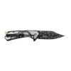 Reverse side of the Dark Side Blades Gold knife showing the stainless steel handle, pocket clip, and embossed skull-pattern blade.