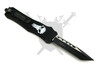 Reverse side of the Armed Force Tactical Model 112LPSTP OTF automatic knife showing the black pocket clip and deployed black American Tanto blade.