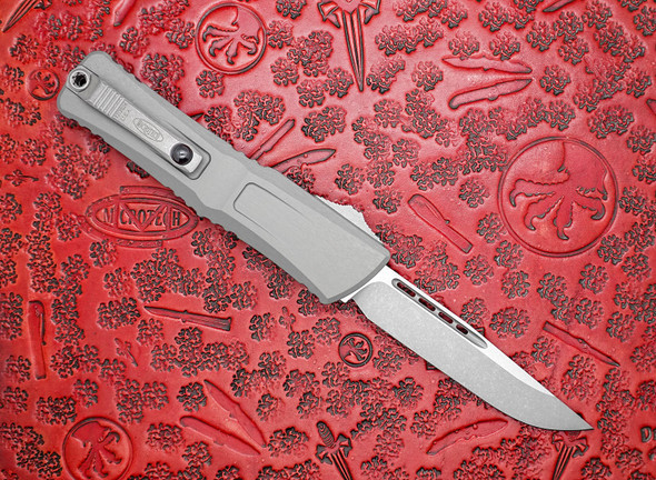 Microtech Combat Troodon Gen III Automatic OTF Apocalyptic Drop Point Blade, Natural Clear Deep Engraved Aluminum Handles