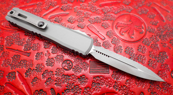 Microtech Ultratech Gen III ZBP (Zero Blade Play) OTF Automatic Knife Natural Clear Double Edge Full Serrated Apocalyptic Stonewash Blade