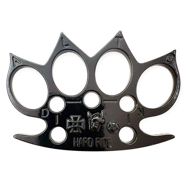 “Hard Ride” black metal brass knuckle paperweight featuring engraved biker-style artwork and lettering.