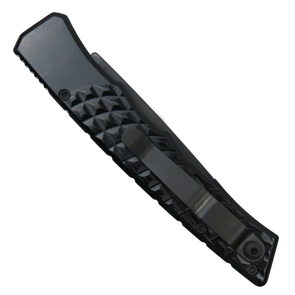 Closed view of the Piranha Crossfire Automatic Knife showing textured black handle and tip-up pocket clip.