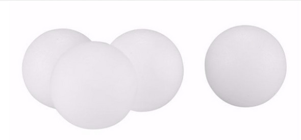 Close-up cluster of white T4E .43 caliber polymer training rounds shown on a white background. Close-up cluster of white T4E .43 caliber polymer training rounds shown on a white background.