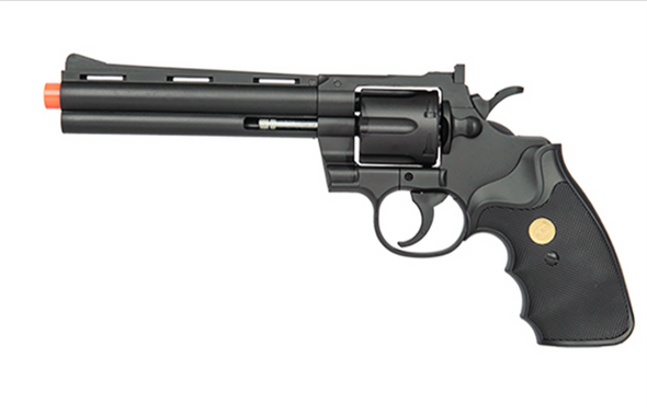 Right-side view of the UK Arms G36B spring revolver pistol in black with an orange safety tip, featuring a long barrel, six-round cylinder, and textured black grip with gold medallion inset. Right-side view of the UK Arms G36B spring revolver pistol in black with an orange safety tip, featuring a long barrel, six-round cylinder, and textured black grip with gold medallion inset.