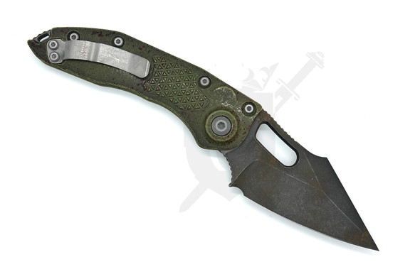 open – reverse view highlighting pocket clip, jimping, and distressed finish detail.