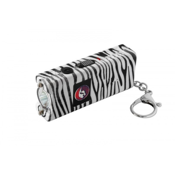 Zebra-pattern Cheetah Nitro Miniature Stun Gun shown angled, displaying LED flashlight lens, safety switch, and attached keychain clip.