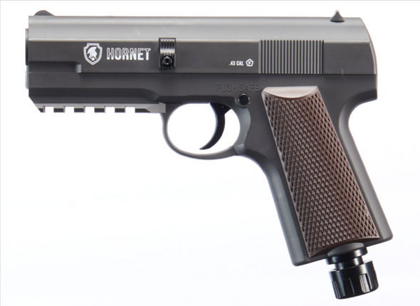 Side profile of the Lancer Defense Hornet .43 Cal CO2 pistol showing safety, grip texture, and accessory rail.