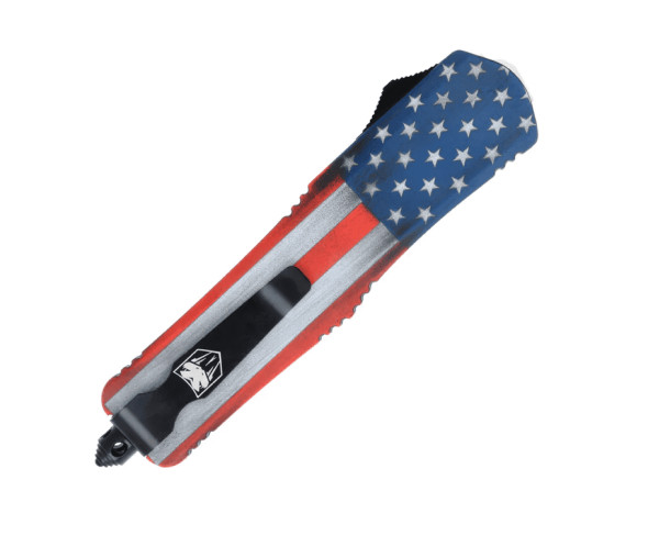 Rear view of FS-3 American Flag OTF highlighting glass breaker and pocket clip.
