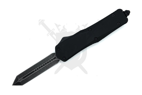 Close view of Gladiator Spartan OTF dagger blade with black stonewash finish