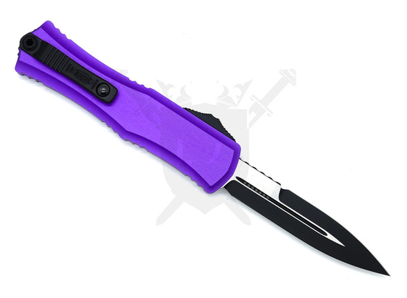 Rear view showing titanium pocket clip and glass breaker on purple handle.