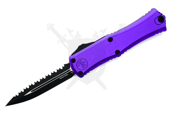 Microtech Hera II Mini deployed showing purple handle and black fully serrated dagger blade