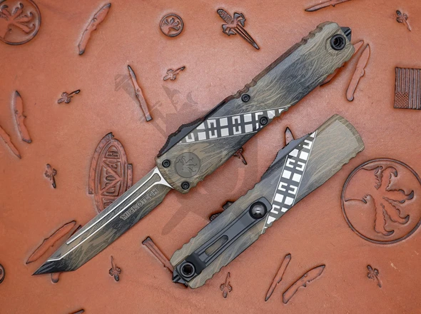Microtech Ultratech Gen IV Wookie Tanto knife front and rear view open and closed on display surface