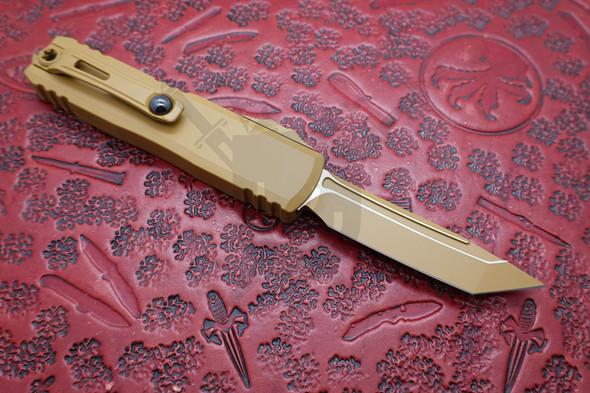 Microtech UTX-85 RAL-8000 reverse side showing clip and glass breaker