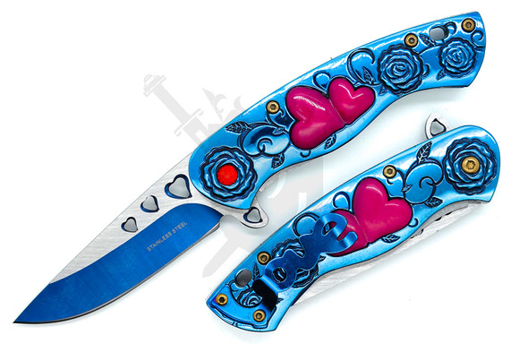 Blue spring assisted pocket knife with pink heart inlays shown opened beside closed view