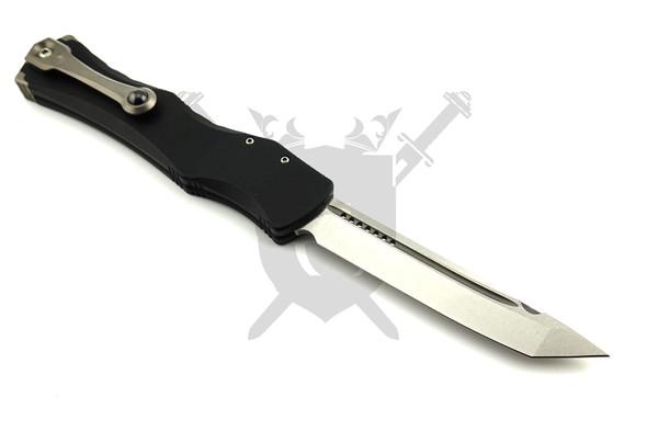 Reverse view of Microtech Halo IV automatic knife showing titanium pocket clip and stonewashed tanto blade