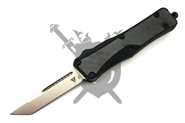 Front view of the Midnight Breach automatic OTF knife showing satin tanto D2 blade and carbon fiber handle
