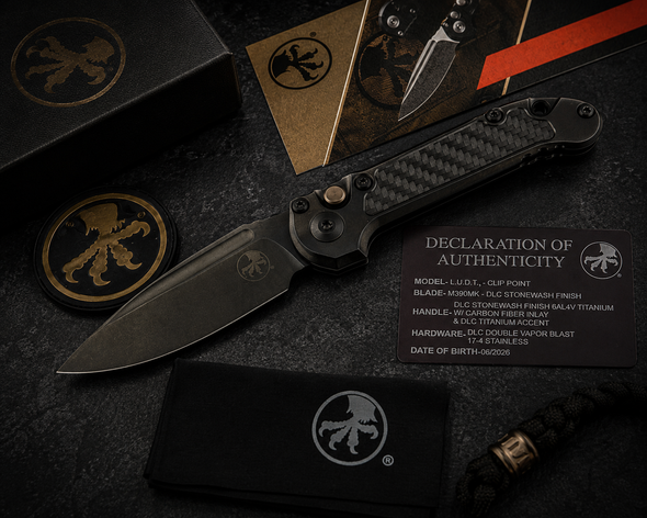 Microtech Marfione Select LUDT Gen III automatic knife with M390 clip point DLC stonewashed blade, titanium carbon fiber handle, presentation box and certificate.