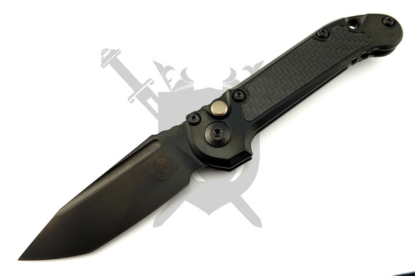 Microtech Marfione Select LUDT Gen III automatic knife open displaying its reinforced M390 tanto blade with DLC stonewashed finish and titanium handle with black carbon fiber inlay.