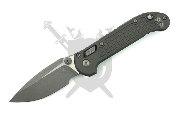 Microtech 1135RL-10APFRNC LUDT RAM-LOK manual knife open with Apocalyptic M390MK drop point blade and Natural Clear Frag aluminum handle.