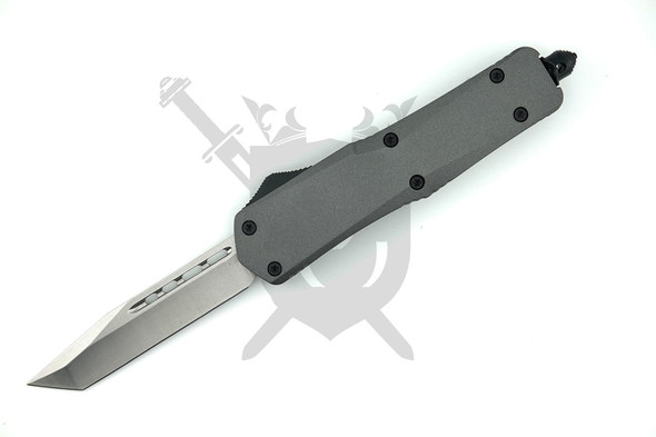 Armed Force Tactical Grey Heavy Duty Line Deployment OTF Automatic Knife 10-929TGYP open with 4-inch satin American Tanto plain edge blade and matte gray zinc alloy handle.