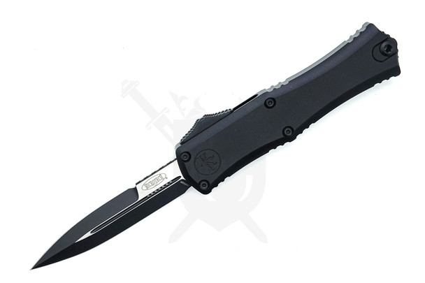 Microtech Hera II Mini OTF AUTO knife open, showing 3.00" black M390MK bayonet blade and black anodized aluminum handle on white background.