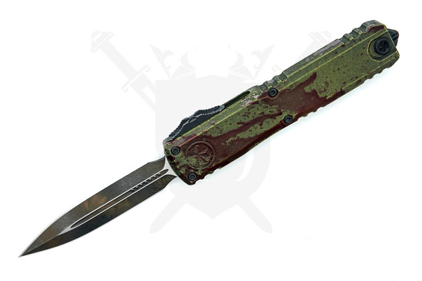 Microtech Ultratech ZBP Outbreak Signature Series OTF Knife, 3.5" double-edge dagger blade deployed, biohazard-engraved green and red handle.