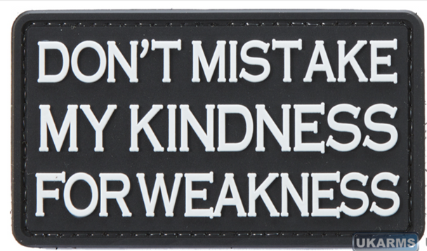 Black PVC morale patch with raised white text reading "Don't Mistake My Kindness for Weakness" and hook backing for Velcro attachment.