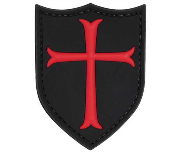 Black shield-shaped PVC morale patch featuring a raised red Knights Templar Crusaders cross with hook-and-loop backing.