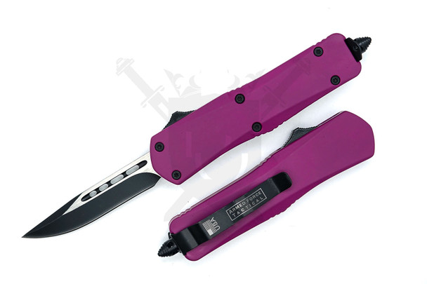 Armed Force Tactical OTF automatic knife with black and silver stainless steel blade deployed and purple rubberized handle on white background
