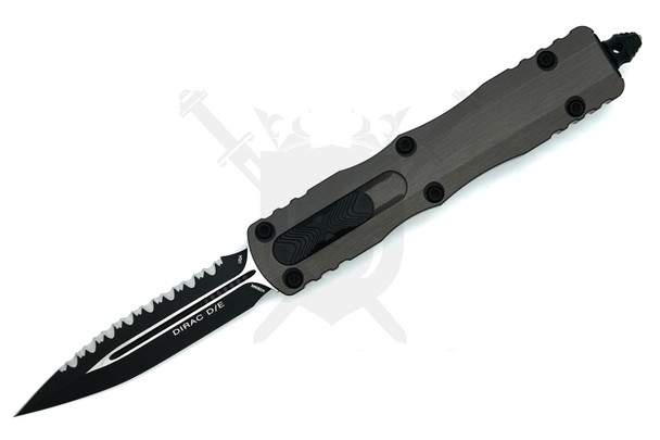 Microtech Dirac deployed showing black fully serrated dagger blade and natural clear handle