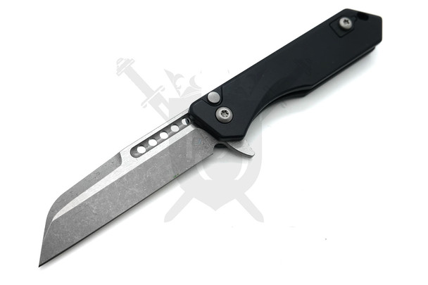 Heretic Jinn knife open with black aluminum handle and battleworn MagnaCut sheepsfoot blade